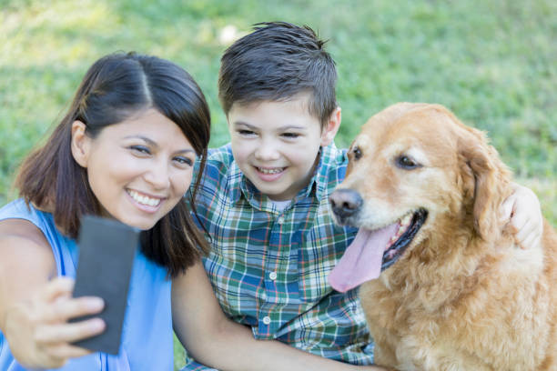 istock Family takes selfie with beloved pet 841934764