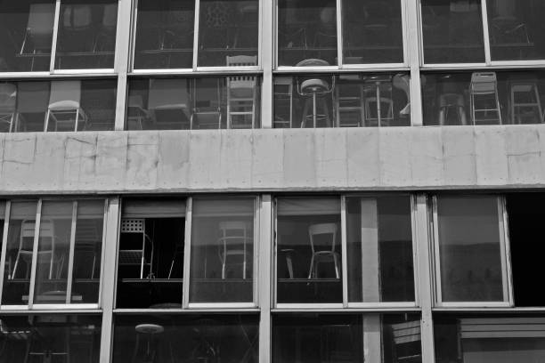 istock Chairs for sale behind dusty windows 841937766