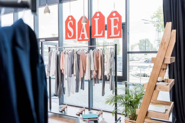 istock rack with hanging clothes in store 841941322