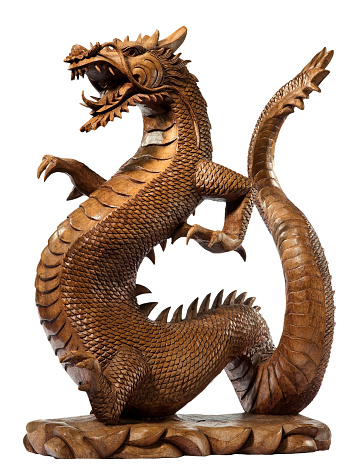 vintage dragon wooden carved isolated on white with clipping path