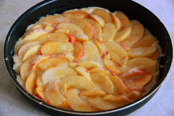 istock Raw charlotte with red apples and sugar 841947148