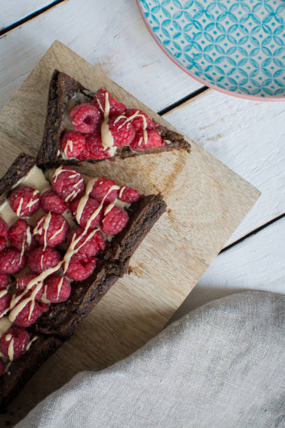 istock Chocolate cake with raspberries and peanut butter 841947442