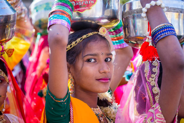 Indian girl wearing traditional Rajasthani dress participate in Desert Festival in Jaisalmer, Rajasthan, India JAISALMER, INDIA - FEBRUARY 08, 2017 : Indian girl wearing traditional Rajasthani dress participate in Desert Festival in Jaisalmer, Rajasthan, India jaisalmer stock pictures, royalty-free photos & images