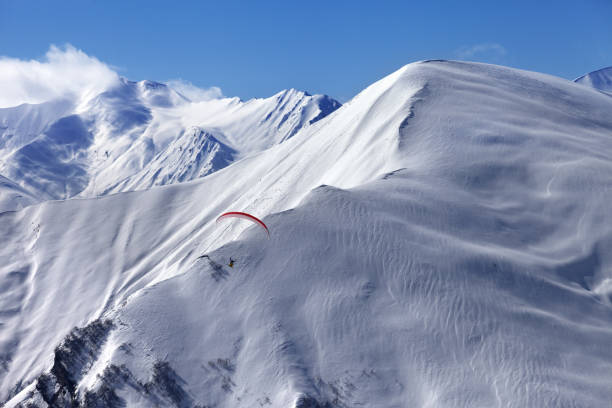 istock Speed flying in snow winter mountains 841949000