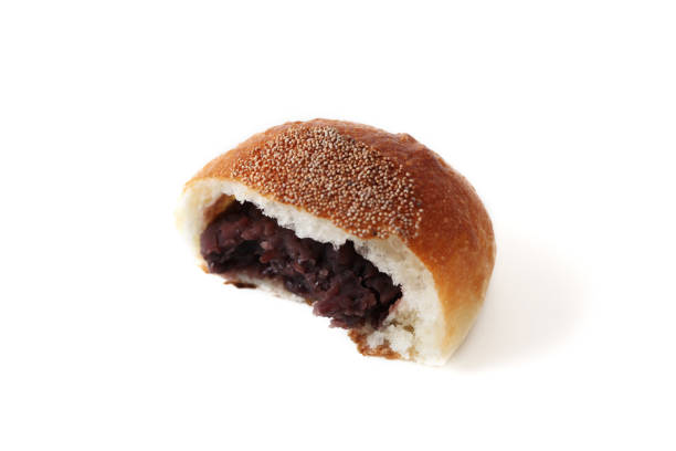 istock half of round bread with azuki bean paste isolated on white background 841951914