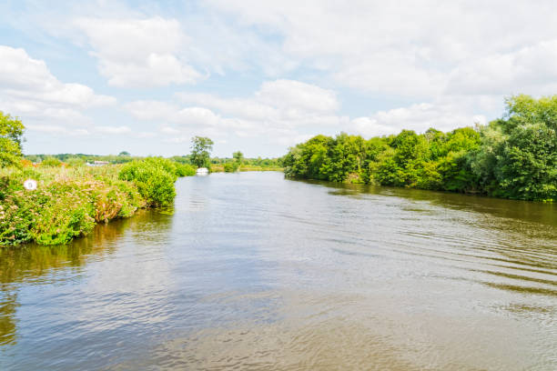 istock Sailing down the River Bure, in Norfolk, on a summer day. 841955942