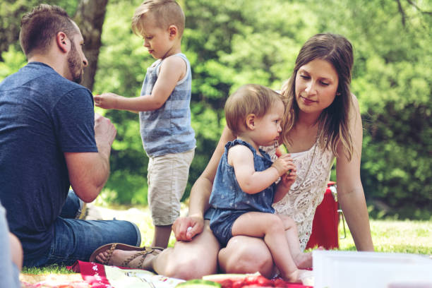 istock Millennial Family having a picnic 841961434