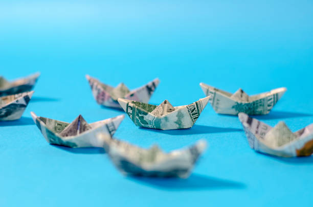 istock more boat dollar banknote on More dollar background 841972272