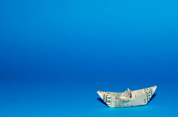 istock more boat dollar banknote on More dollar background 841972302