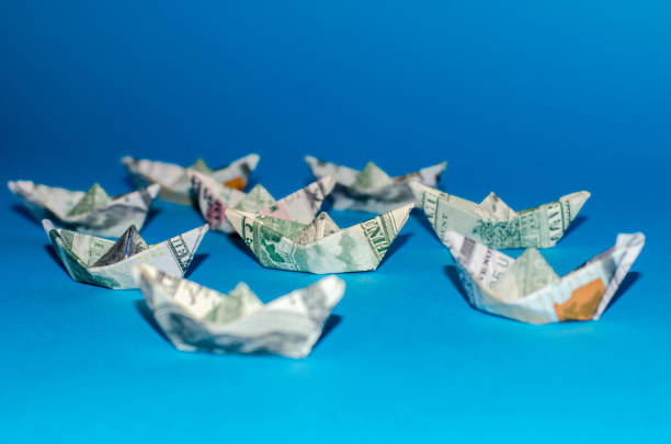 istock more boat dollar banknote on More dollar background 841974572