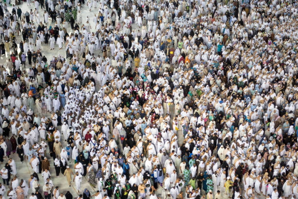 Muslim pilgrims touring the holy Kaaba in Mecca in Saudi Arabia Mecca, Saudi Arabia - September 8, 2016: Muslim pilgrims revolving around the holy Kaaba by walking during Hajj in Mecca Saudi Arabia kaabah stock pictures, royalty-free photos & images