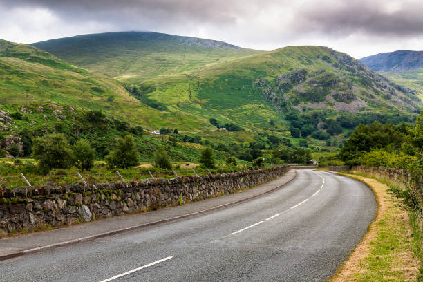 istock Curved road in Welsh countryside 841978832