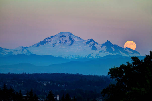 istock snow mountain with moonrise at sunset 841981484