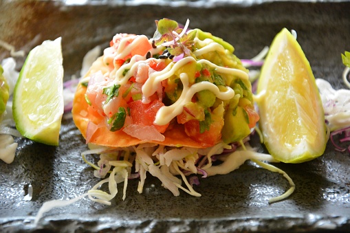 Fish market ceviche with lemons.