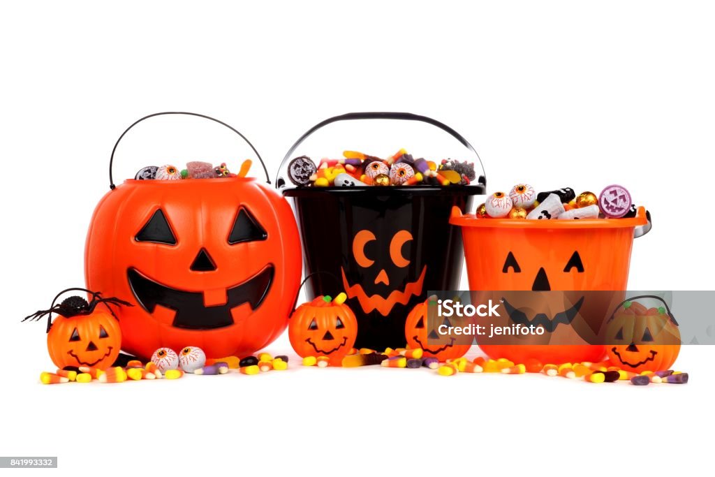 Halloween Jack o Lantern candy collectors isolated on white Group of assorted Halloween Jack o Lantern candy collectors isolated on a white background Candy Stock Photo