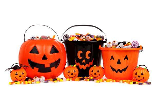 Halloween Jack o Lantern candy collectors isolated on white Group of assorted Halloween Jack o Lantern candy collectors isolated on a white background eye candy stock pictures, royalty-free photos & images