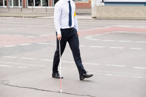 istock Blind Person Walking On Street 841998776