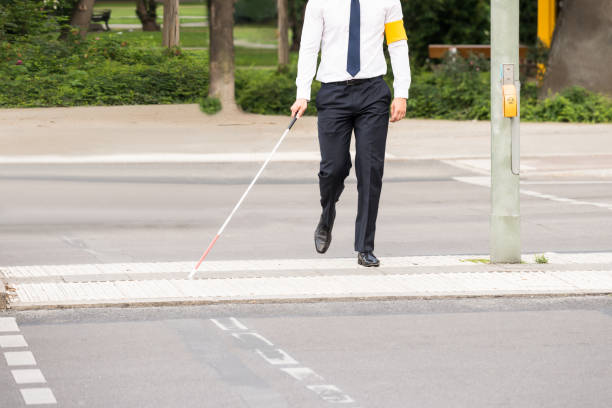 istock Blind Person Walking On Street 841998884