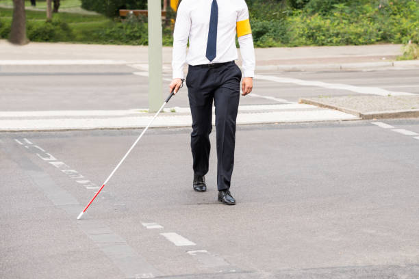 istock Blind Person Walking On Street 841998948