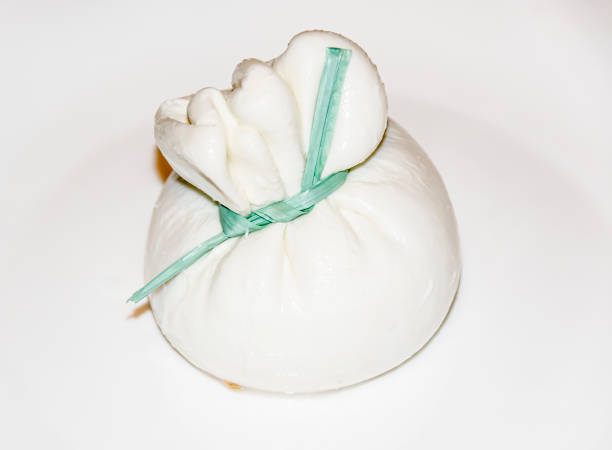 istock Italian tender cheese burrata cheese on a white plate 842001030