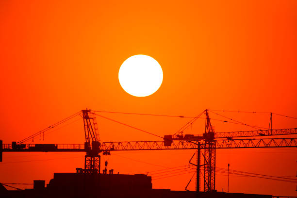 istock Sunrise and Construction Cranes in Denver Colorado 842004208
