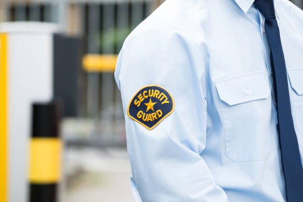 Male Security Guard In Uniform Close-up Of A Male Security Guard In Uniform security guard stock pictures, royalty-free photos & images