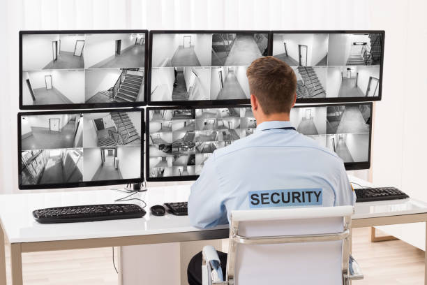 istock Security Guard Monitoring Multiple CCTV Footage 842004704