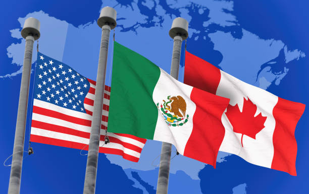 istock Canada, Mexico and US Flags over blue sky, conceptual image for Nafta agreement (3D rendered image) 842005212