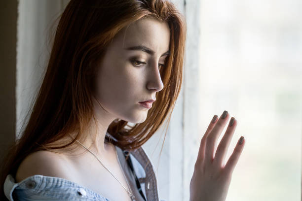 istock sad female portrait 842008320
