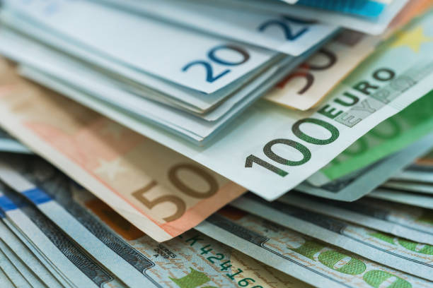 istock Euro and USA dollar money banknotes background 842014552