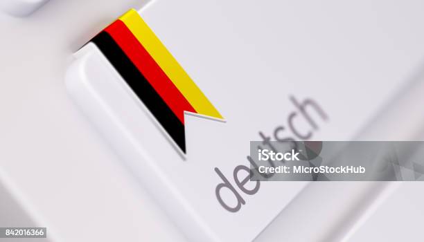 Modern Keyboard With German Language Option In German Online Dictionary Concept Stock Photo - Download Image Now