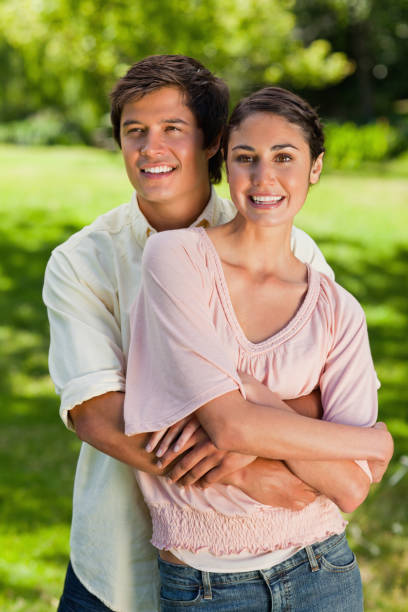 istock Man looking into the distance while he is holding his friend 842039092