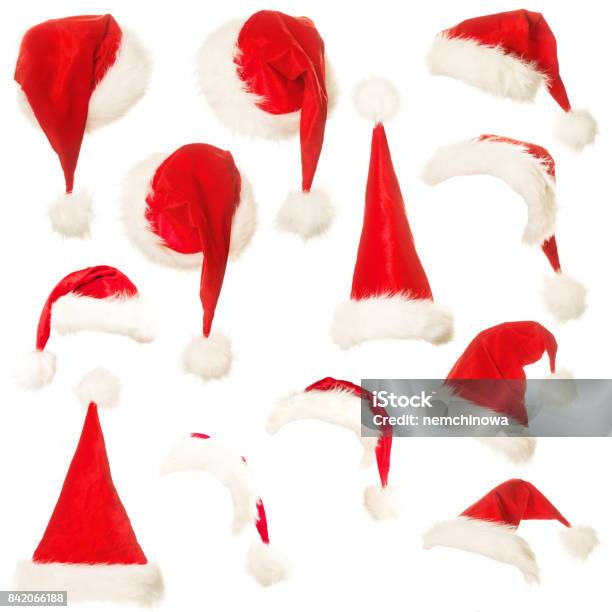 Conjunto De Santa Sombrero Aislado En Fondo Blanco Foto de stock y más banco de imágenes de Gorro de Papá Noel - Gorro de Papá Noel, Recortable, Navidad