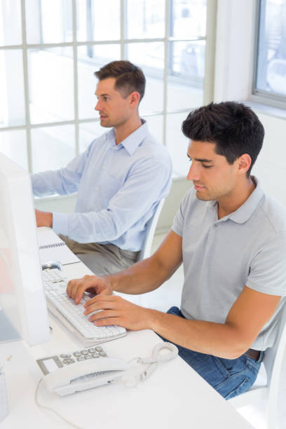 istock Casual businessmen working at desk 842068662