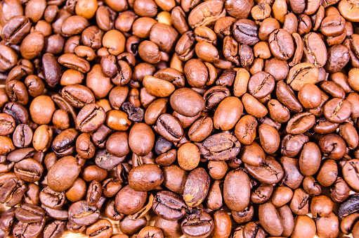 Pile of the roasted coffee beans for background