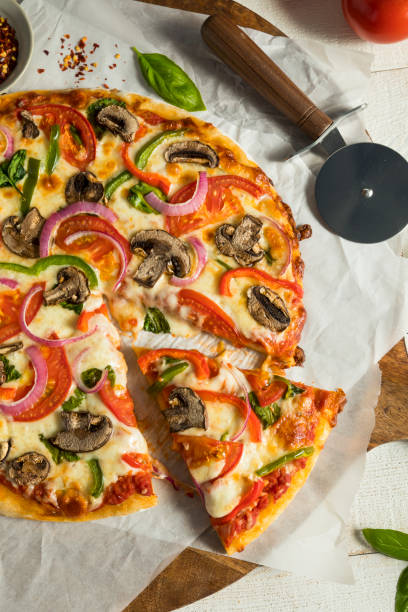 istock Homemade Veggie Pizza with Mushrooms Peppers 842081748