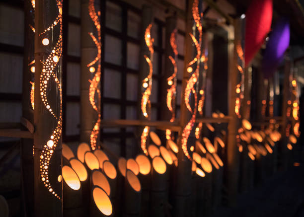 istock Candle lights in bamboo poles 842082196