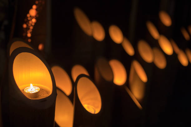 istock Candle lights in bamboo poles 842082240