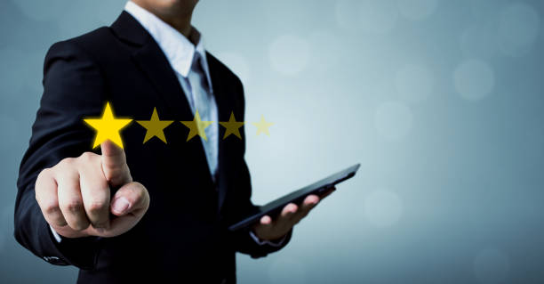 Review and rating increase company concept, Businessman hand touching five star Review and rating increase company concept, Businessman hand touching five star interest rate photos stock pictures, royalty-free photos & images
