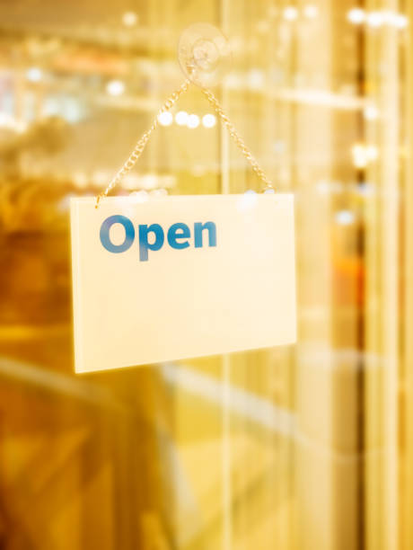 istock Open sign on a glass door 842089070