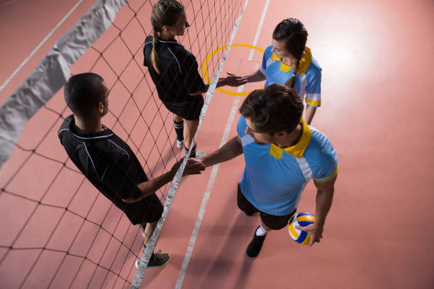 istock High angle view of volleyball players shaking hands 842089868