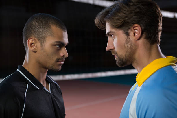 istock Aggressive male volleyball players looking each other 842089942