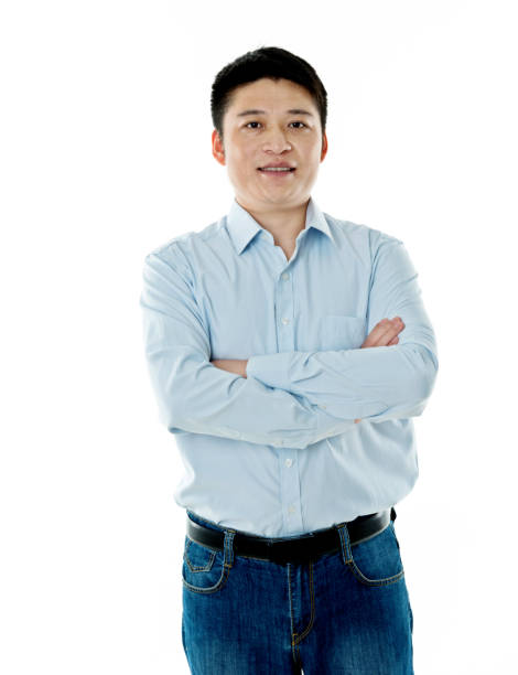 istock Asian businessman standing against white background 842100752