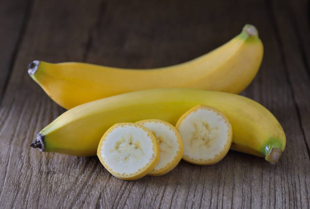 istock Banana on wood 842107548