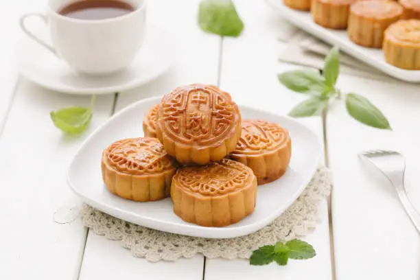 Delicious Mooncake, a kind of traditional Chinese Snack for Mid-Autumn Festival on the Table.