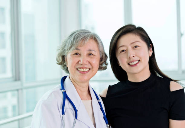 istock Senior female doctor with her patient 842108254
