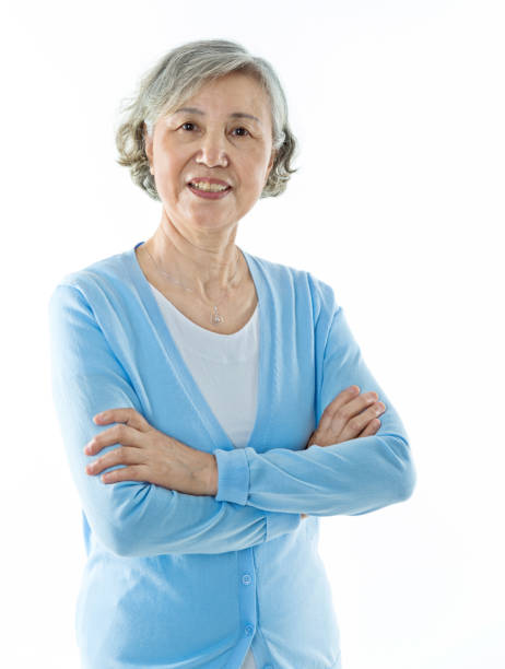 istock Beautiful senior woman smiling against white background 842112676