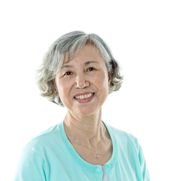 istock Beautiful senior woman smiling against white background 842112708