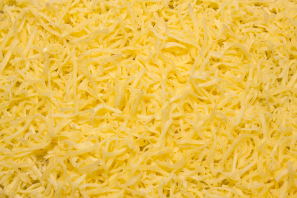 Grated  cheese close up texture,food background