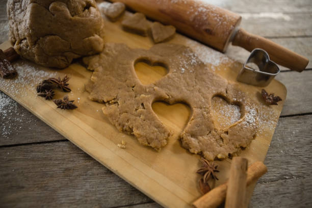 istock High angle view of dough with rolling pin 842130112